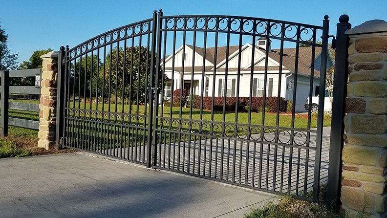 Should a Security Driveway Gate Be Built With Specific Fencing Materials?