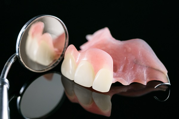 Revitalize Your Smile with Denture Options for Restoring Missing Teeth