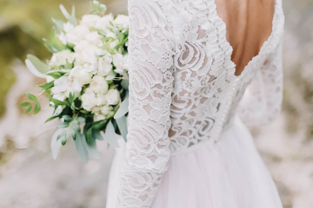 A Symphony of Style: How to Match Lace Details in Country Wedding Dresses with Black Bridesmaid Dresses